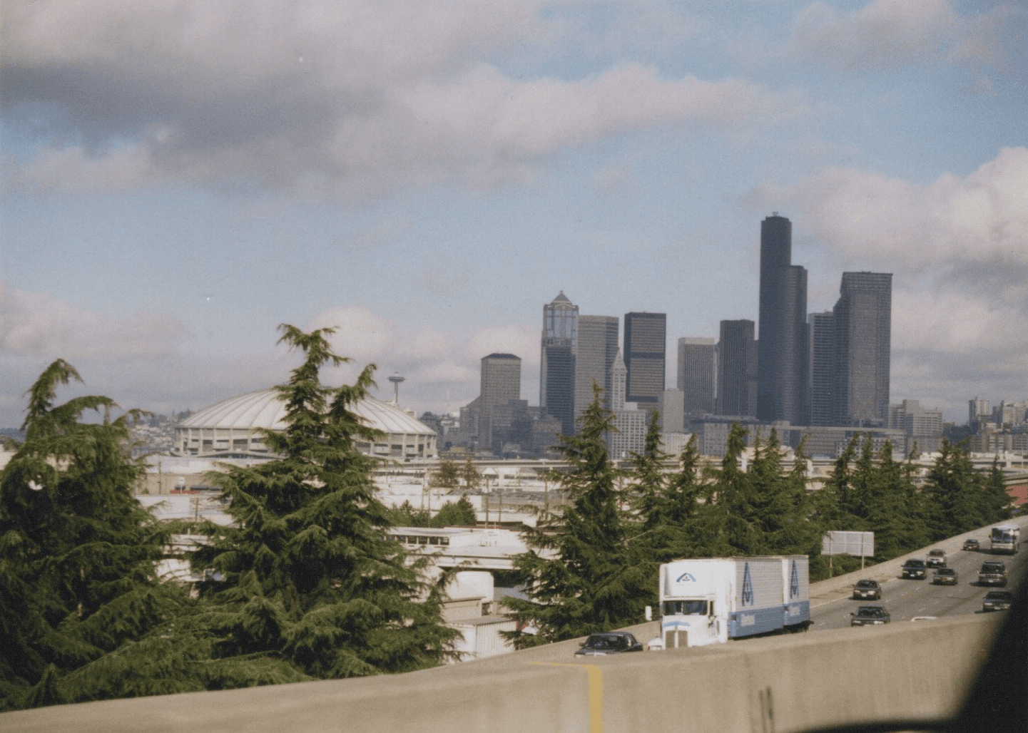 The downtown Seattle skyline and Kingdome viewed from the freeway in 1996