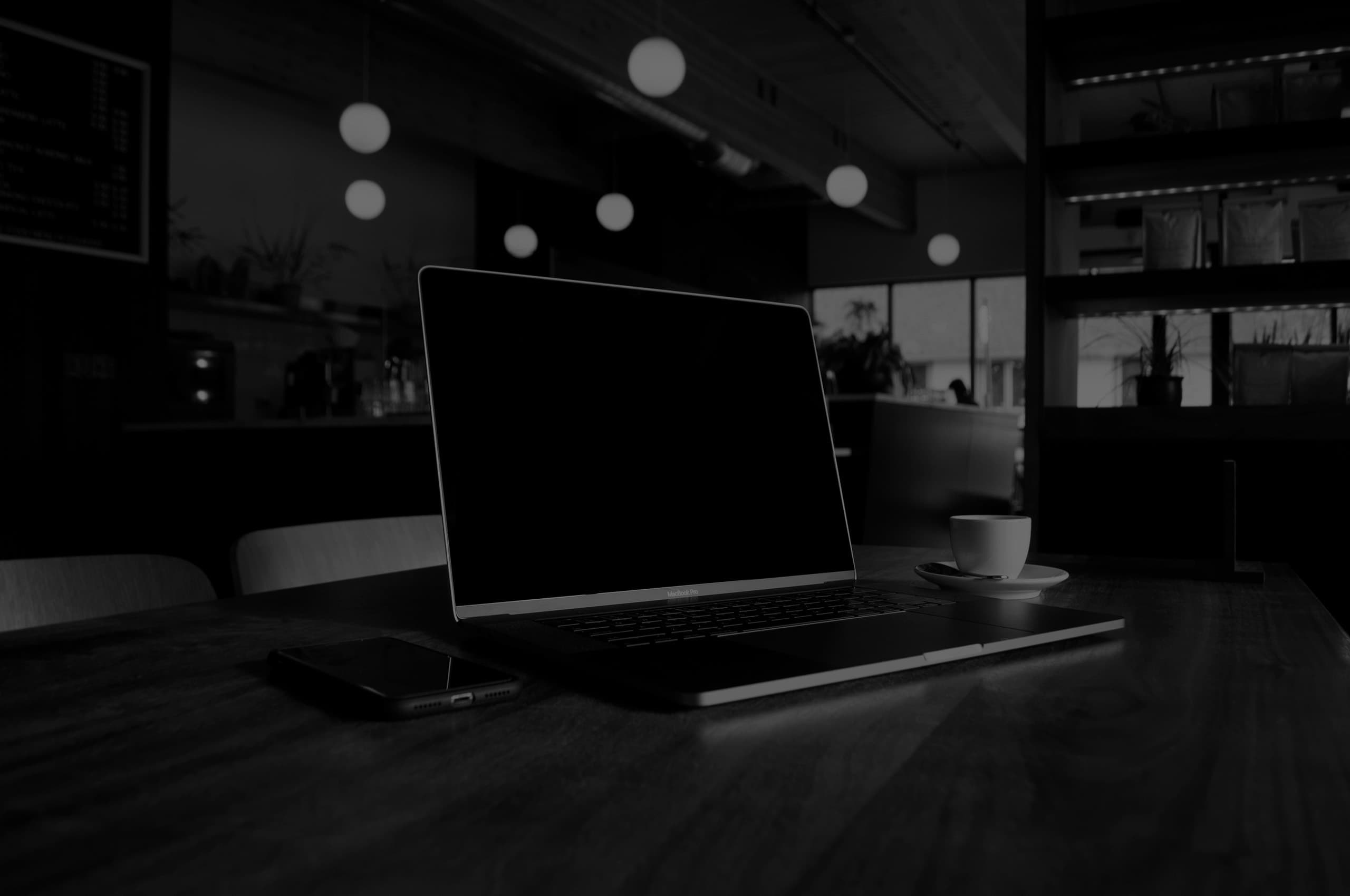 A Broadside work table with devices and project material